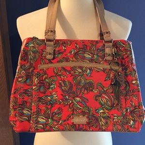 Sakroots red orange hummingbird purse.